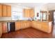 Open kitchen with light wood cabinets, granite countertops and stainless steel appliances at 16873 Boreas Ct, Parker, CO 80134