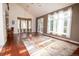 Spacious living room with hardwood floors, large windows, and plenty of natural light at 16873 Boreas Ct, Parker, CO 80134