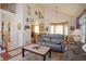 Open-concept living space with living room, dining area, and adjacent kitchen; great for entertaining at 16873 Boreas Ct, Parker, CO 80134