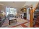 Inviting living room with a fireplace, comfortable seating, and a staircase at 16873 Boreas Ct, Parker, CO 80134
