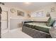 Comfortable bedroom featuring a daybed with decorative accents and pictures at 9391 Lilly Ct, Thornton, CO 80229
