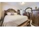 Bedroom featuring a decorative wood dresser and accents with a bright window at 9391 Lilly Ct, Thornton, CO 80229