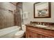 Bathroom with tile surround shower and vanity with granite counters at 59 Gold Run Rd, Breckenridge, CO 80424