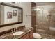 Bathroom with tile shower and vanity with granite counters at 59 Gold Run Rd, Breckenridge, CO 80424