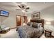 Bedroom features a ceiling fan, carpeted floors, neutral paint, and ensuite access at 59 Gold Run Rd, Breckenridge, CO 80424