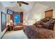Comfortable bedroom with a luxurious bed, sitting area, and a view of the snowy outdoors at 59 Gold Run Rd, Breckenridge, CO 80424