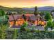 Stunning home with a three-car garage, stone accents, and mountain views at 59 Gold Run Rd, Breckenridge, CO 80424
