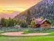 Beautiful home next to a golf course with mountain views at sunset at 59 Gold Run Rd, Breckenridge, CO 80424
