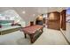 Large game room with a pool table, and a comfortable seating area with an entertainment center at 59 Gold Run Rd, Breckenridge, CO 80424