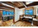 Charming kitchen with a breakfast nook, wooden benches, and scenic window views at 59 Gold Run Rd, Breckenridge, CO 80424