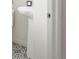 Small bathroom with pedestal sink and patterned floor at 10860 Lyric St, Lone Tree, CO 80134