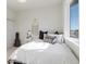Bedroom with window, guitar, and modern decor at 10860 Lyric St, Lone Tree, CO 80134
