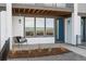 Inviting front porch with a modern chair and landscaping at 10860 Lyric St, Lone Tree, CO 80134