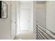 Bright hallway with carpet flooring and doors to bedrooms at 10860 Lyric St, Lone Tree, CO 80134