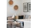 Living room with grey sectional sofa and round coffee table at 10860 Lyric St, Lone Tree, CO 80134