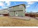 Backyard featuring a small grass area and a patio at 10505 Wheeling St, Commerce City, CO 80022