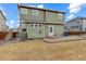 Private backyard with a stone patio and lawn, providing a peaceful outdoor retreat at 10505 Wheeling St, Commerce City, CO 80022