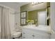 Bathroom featuring a tub-shower combination and a modern white vanity at 10505 Wheeling St, Commerce City, CO 80022