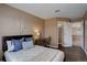 Spacious bedroom with a walk-in closet, work desk, and comfortable bed setup at 10505 Wheeling St, Commerce City, CO 80022