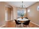 Stylish dining area showcasing modern lighting and tasteful decor, ideal for entertaining at 10505 Wheeling St, Commerce City, CO 80022