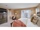 Spacious main bedroom offering a large window and complemented by a spacious closet at 10505 Wheeling St, Commerce City, CO 80022