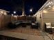 Charming backyard patio featuring comfortable seating around a fire pit at 3907 S Lincoln St, Englewood, CO 80113