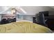 Bedroom showcasing sloped ceilings, carpet, and keyboard at 3907 S Lincoln St, Englewood, CO 80113