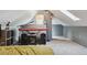 Bedroom featuring sloped ceilings, carpet, and keyboard at 3907 S Lincoln St, Englewood, CO 80113