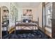 Cozy bedroom featuring natural light, hardwood floors, and soft textures, creating a serene and comfortable retreat at 3907 S Lincoln St, Englewood, CO 80113