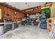 Spacious garage interior with ample storage, organizing shelves, grills, and tools at 3907 S Lincoln St, Englewood, CO 80113