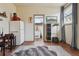 Charming living area with integrated kitchen and a view into the well-lit bathroom at 3907 S Lincoln St, Englewood, CO 80113