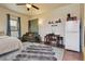 Well-appointed living room including dining area, kitchen, and a comfortable sofa and bed at 3907 S Lincoln St, Englewood, CO 80113