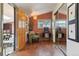 Cozy room with hardwood floors, vintage furniture, natural light and accent wall at 3907 S Lincoln St, Englewood, CO 80113