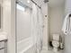 Clean bathroom featuring a modern shower and updated fixtures at 4025 Jason St # 101, Denver, CO 80211