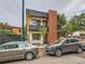 Street view of the modern home featuring a brick facade and contemporary design details at 4025 Jason St # 101, Denver, CO 80211