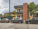 Modern home featuring a brick facade, complemented by contemporary design and landscaping at 4025 Jason St # 101, Denver, CO 80211