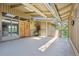Covered front patio with double doors, a skylight, and beautiful stone accents at 5073 N Lariat Dr, Castle Rock, CO 80108