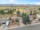 Beautiful home with view of neighborhood park, mature trees, and distant mountains at 7325 Taft Ct, Arvada, CO 80005