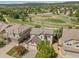 An aerial view showcases this property with a well maintained lawn and mature trees at 4194 Beautiful Cir, Castle Rock, CO 80109