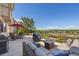 Relax and unwind in this backyard oasis, featuring a cozy fire pit and comfortable outdoor seating at 4194 Beautiful Cir, Castle Rock, CO 80109