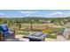 Lounge in style while overlooking stunning mountain views in this luxurious backyard at 4194 Beautiful Cir, Castle Rock, CO 80109