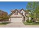 Charming two-story home with a well-manicured lawn, a two-car garage and beautiful curb appeal at 4194 Beautiful Cir, Castle Rock, CO 80109