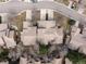 Overhead view highlighting rooftops, driveways, and surrounding trees at 16052 Deer Ridge Dr # B, Morrison, CO 80465