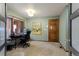 Inviting home office featuring natural light, neutral paint, and a cozy, woven rug at 16052 Deer Ridge Dr # B, Morrison, CO 80465