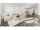 Open concept living room with adjacent kitchen and dining area at 4304 Ridgewalk Pt, Castle Rock, CO 80108