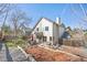 This home features a delightful backyard with a patio, garden area, and a manicured lawn perfect for relaxation at 6868 Johnson St, Arvada, CO 80004
