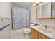 Full bathroom with shower-tub combination at 6868 Johnson St, Arvada, CO 80004