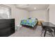Cozy bedroom with natural light, carpeted floors, and neutral wall color at 6868 Johnson St, Arvada, CO 80004
