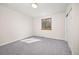 Neutral bedroom featuring a window and closet at 6868 Johnson St, Arvada, CO 80004
