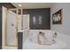 Bright bathroom with a separate shower and soaking tub at 5107 Pasadena Way, Broomfield, CO 80023